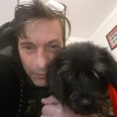 HIFU focal therapy patient holding his dog